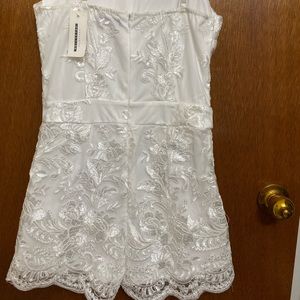 Super cute lace white romper! Didn’t fit me!